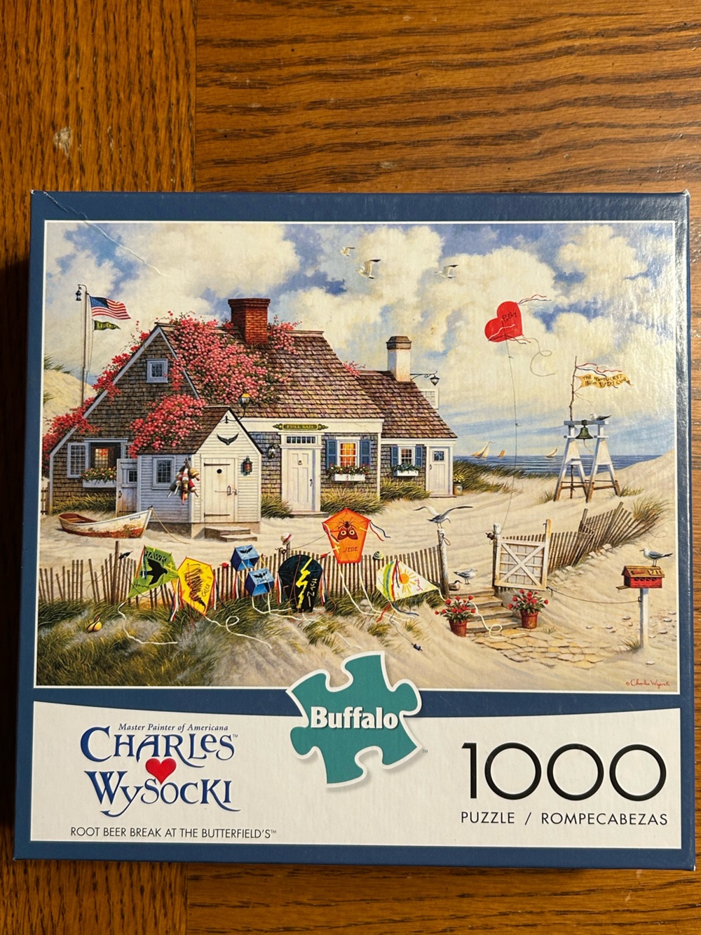 Buffalo 1000-Piece Puzzle — Blue Coastal Cottage Scene